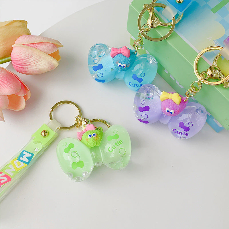 Wholesale PVC Liquid Into The Oil Bow Cartoon Keychain